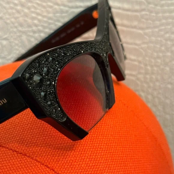 Miu Miu Black Crystal Embellished Cat-Eye Sunglasses SMU O2Q display picture 2